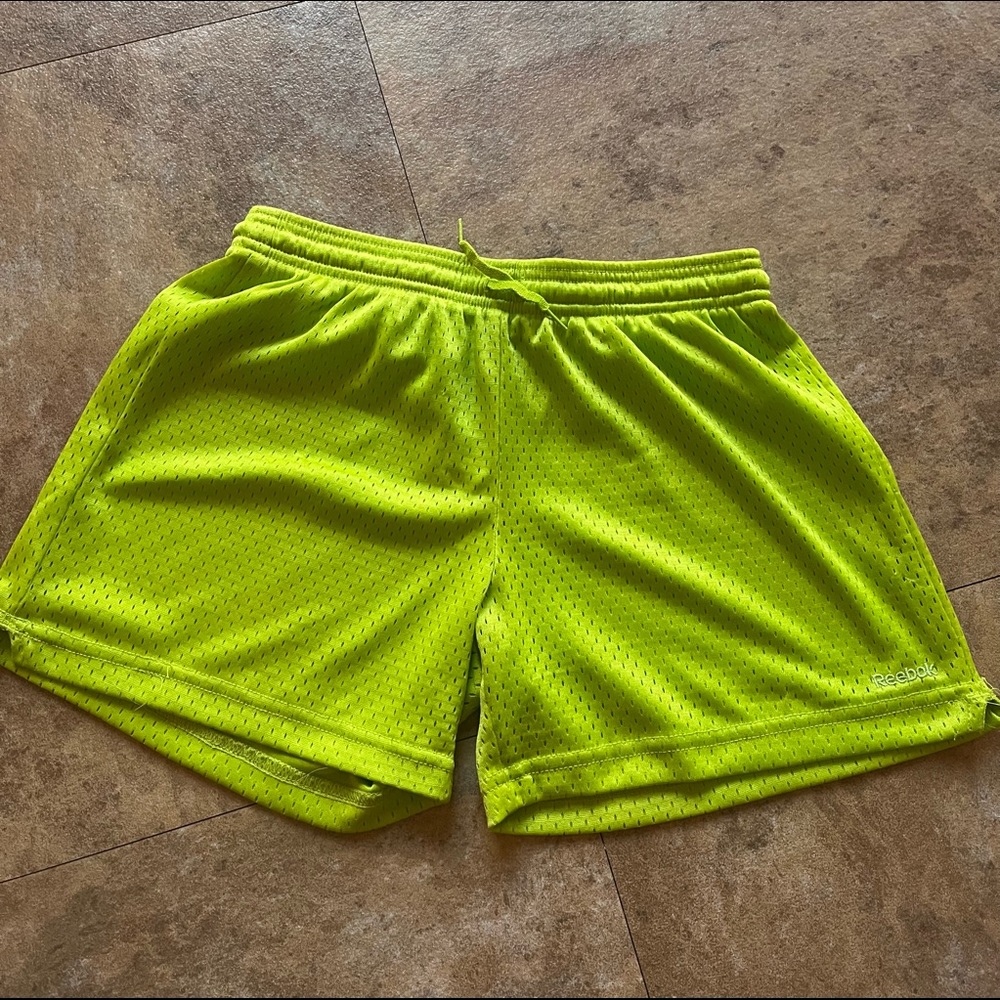 Lime green Reebok running shorts